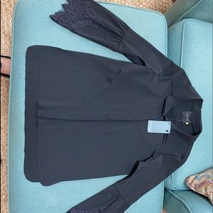 Lysse blouse; black, size small.
